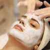 Therapist applying a facial mask during SHBBFAS005 facial treatments training at Dermaskin Academy